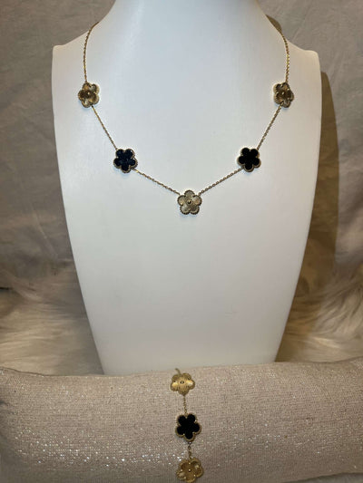 Collier trèfle or et noir